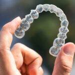 Now that you have your Invisalign, you might be wondering how to clean aligners. Keep reading and learn how it works here.
