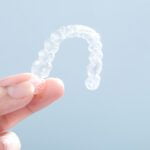 Are you looking to get invisalign and wondering about the costs? Learn what factors affect invisalign cost and where you can save money.