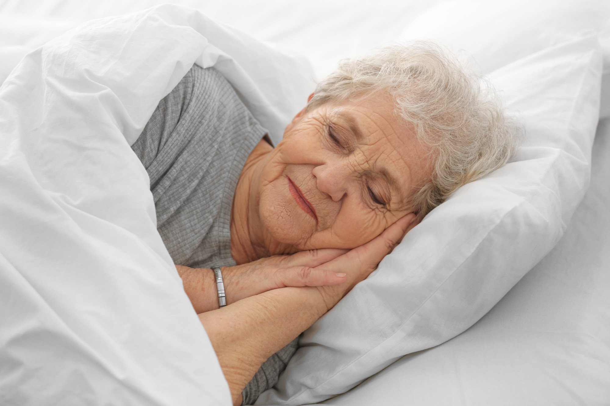 An elderly person sleeping a lot: why is it happening? You could be wondering about the cause, and if you should be concerned. This post will explain things.